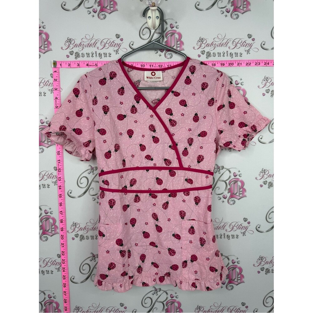 White Cross scrubs top Pink Ladybug Print Wrap-Style Scrub Top